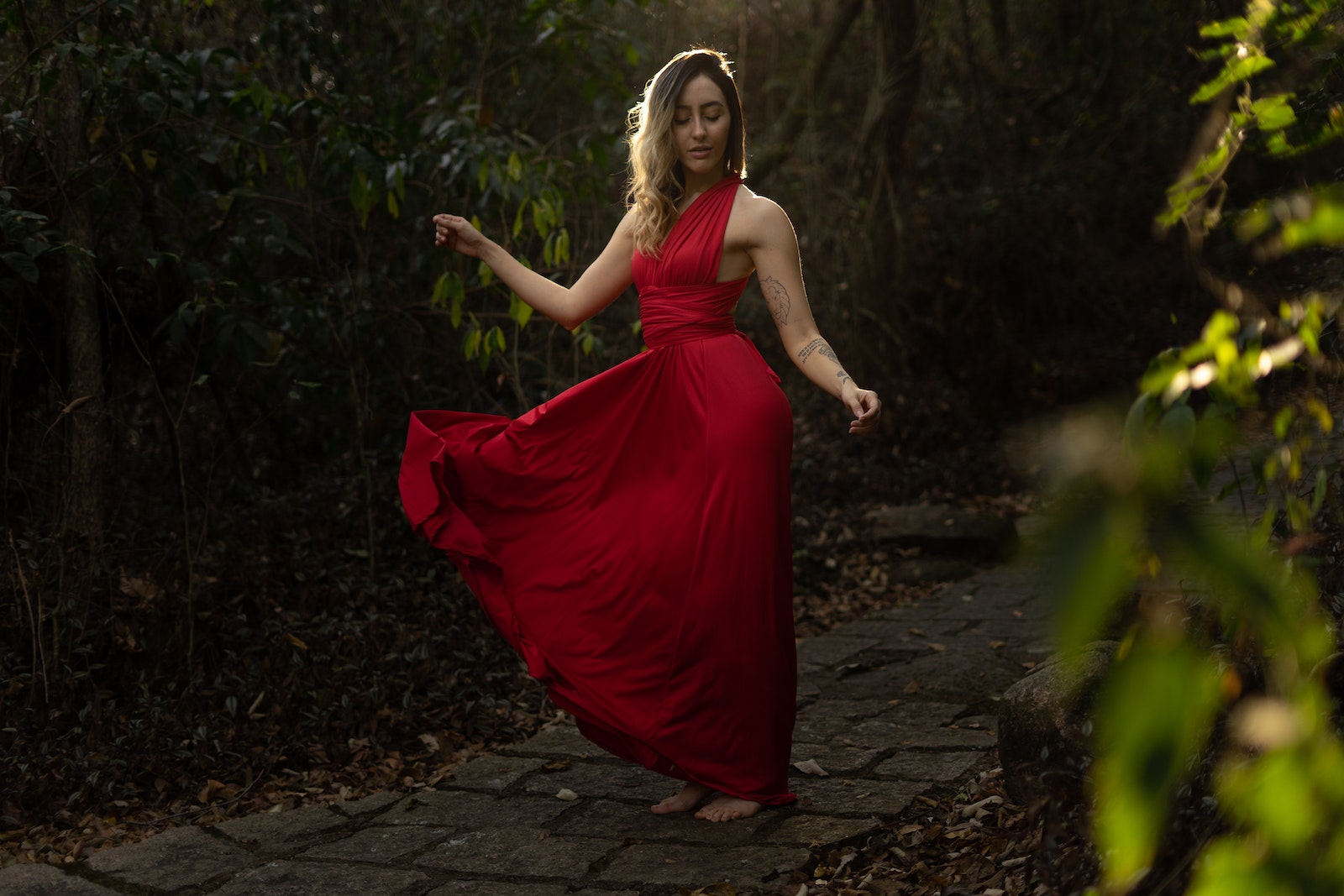 Photo of Woman Wearing Red Dress