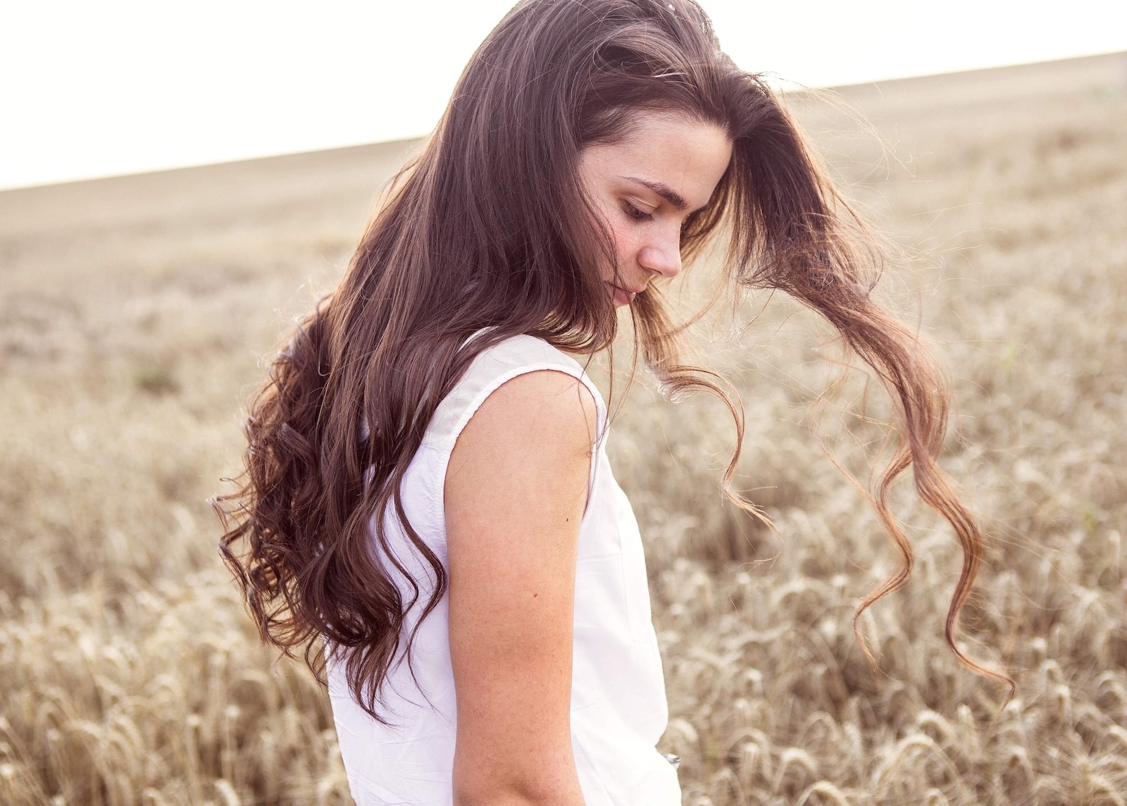 woman standing on grass field